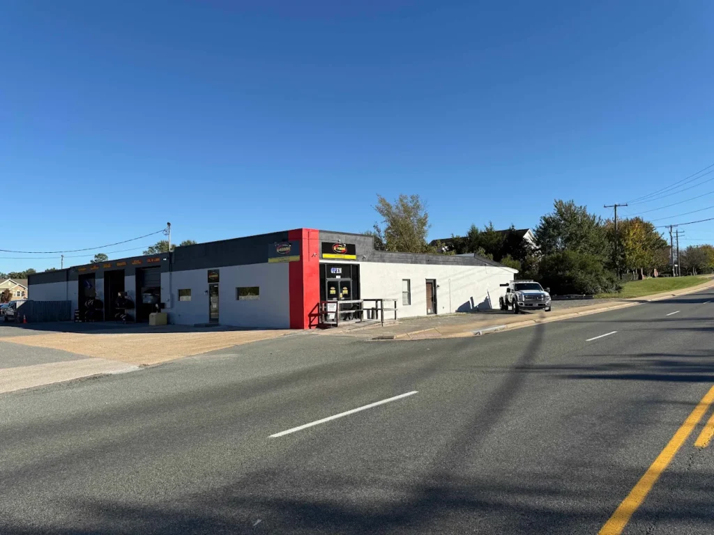Wide view of Aarrow Transmissions & Automotive shop exterior